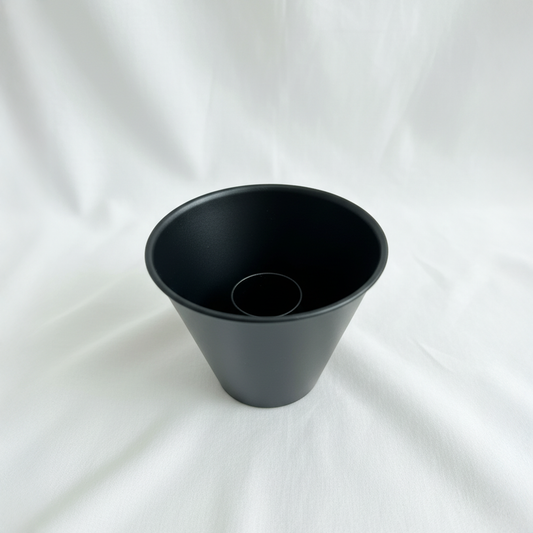 Black iron pot on a white background